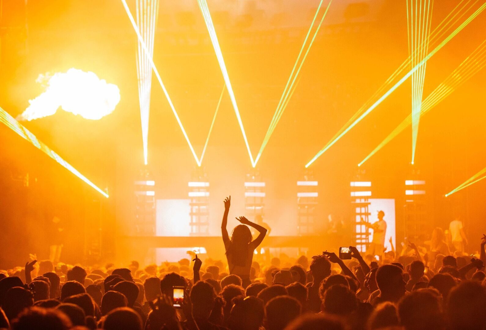 beautiful-shot-live-concert-performance-with-yellow-light-show-big-crowd-cheering